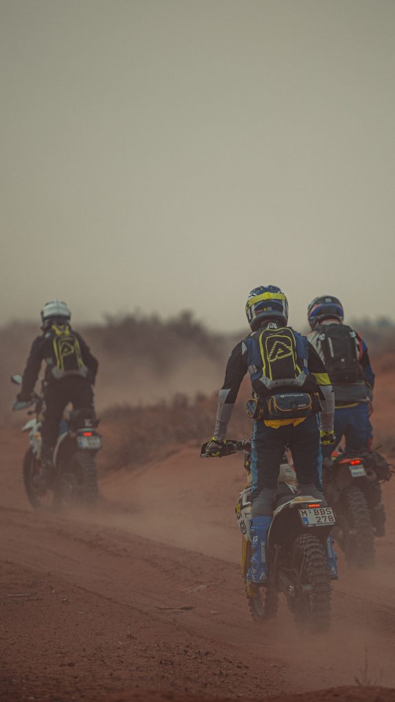 Riders in a cloud of dust in Morocco